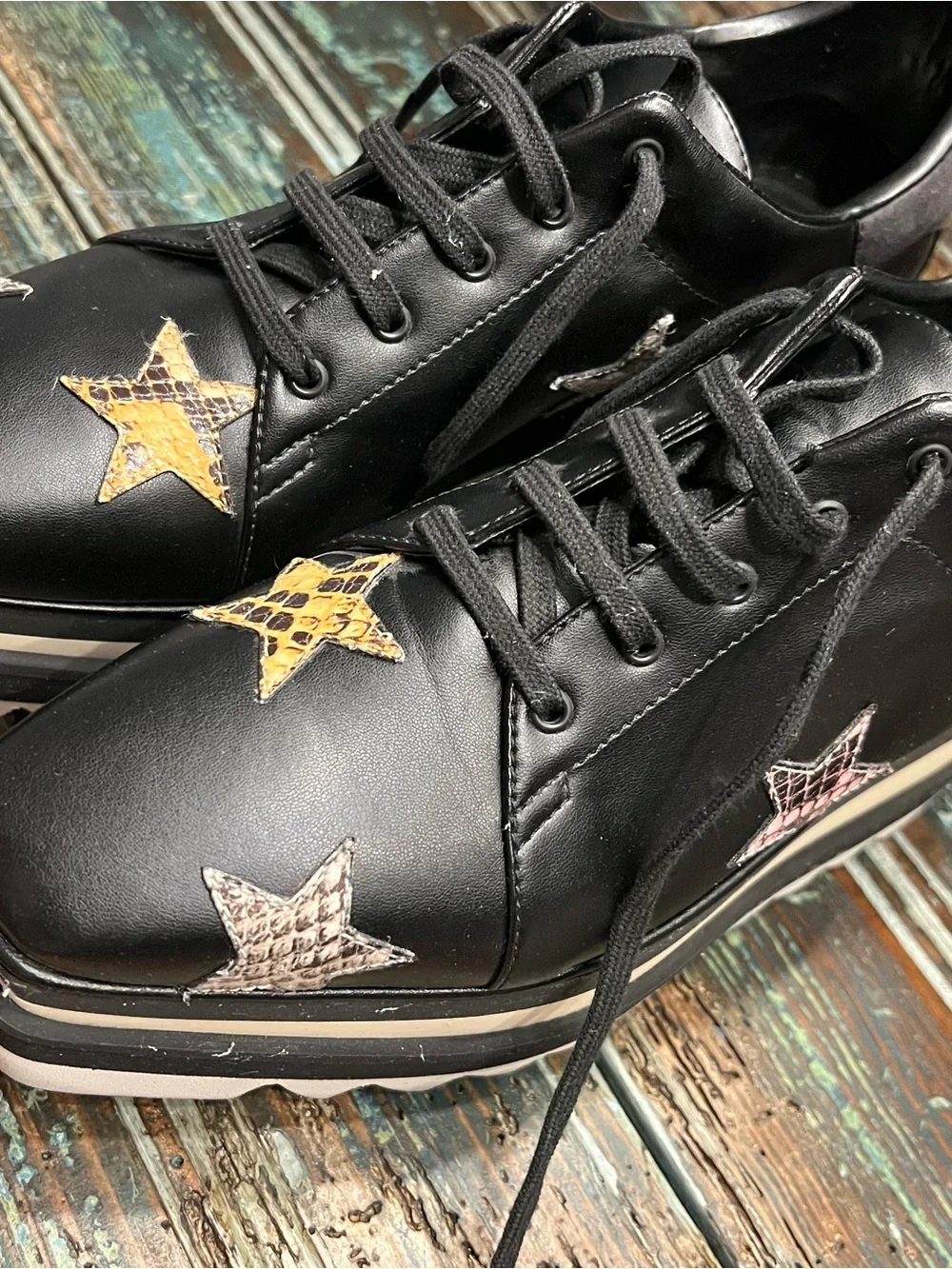 Stella McCartney Black Platform Lace-Up Sneakers with Multicolor Star Accents